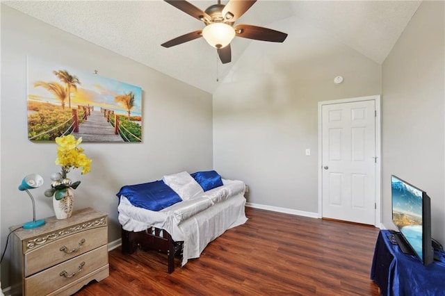 living area with wood finished floors, baseboards, a ceiling fan, and high vaulted ceiling
