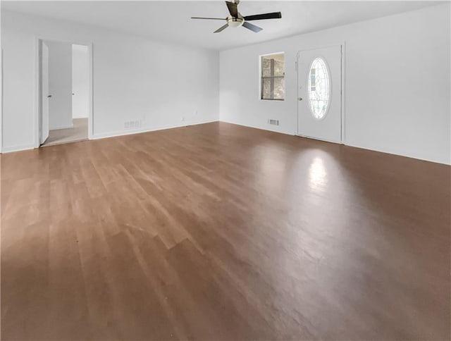 interior space featuring wood-type flooring and ceiling fan