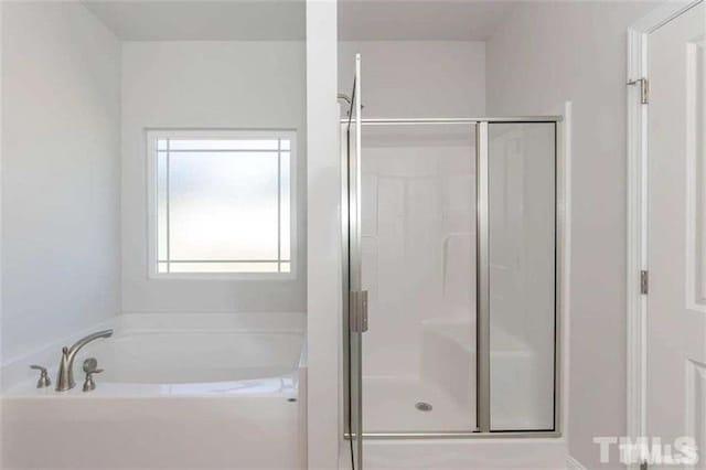 251 Eason St, Bowdon, GA 30108 - full bathroom with a shower stall and a garden tub