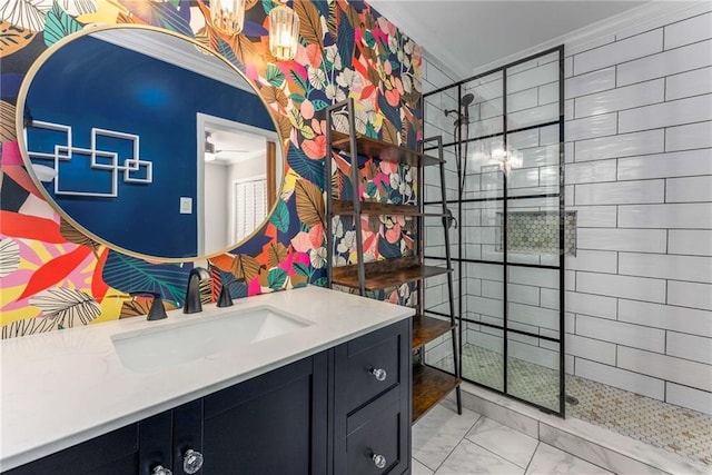 full bathroom featuring marble finish floor, walk in shower, and vanity