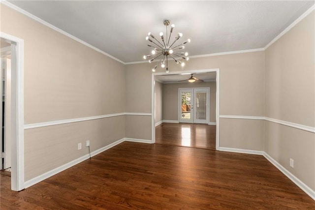 unfurnished dining area with a notable chandelier, crown molding, baseboards, and wood finished floors