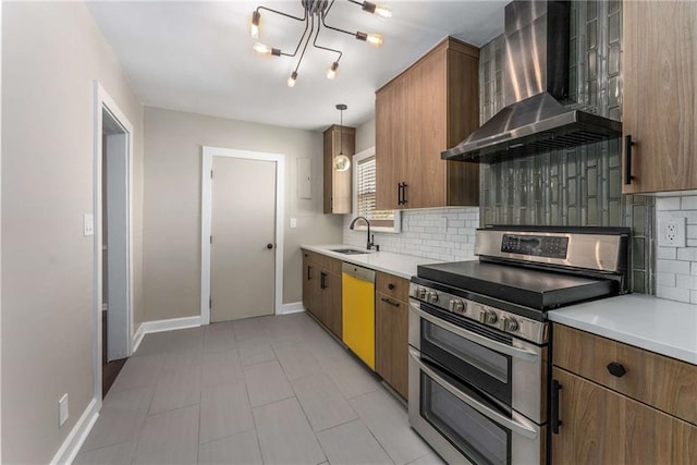 kitchen with dishwashing machine, a sink, wall chimney range hood, backsplash, and double oven range