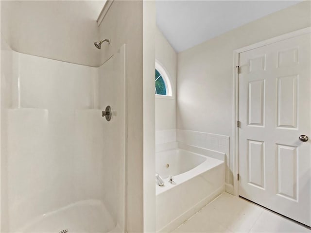 1792 Portwest Way, Hampton, GA 30228 - bathroom featuring a garden tub, a stall shower, and tile patterned floors