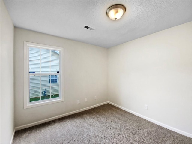 1792 Portwest Way, Hampton, GA 30228 - carpeted empty room featuring baseboards and a textured ceiling