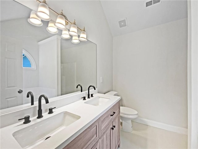 1792 Portwest Way, Hampton, GA 30228 - full bath featuring toilet, double vanity, lofted ceiling, and baseboards