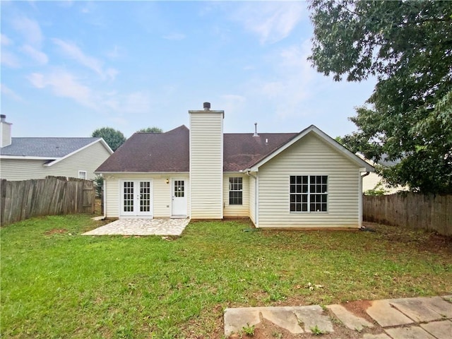 1792 Portwest Way, Hampton, GA 30228 - rear view of property with a patio and a chimney