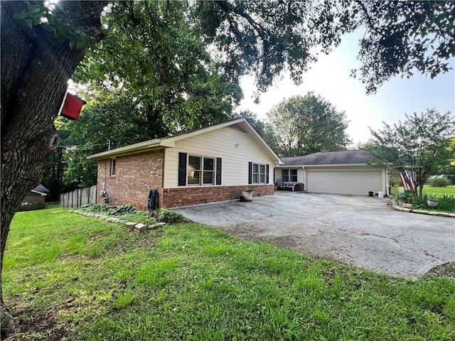 2194 Meadow Dr, Snellville, GA 30078 - view of front of home with brick siding, driveway, and a garage