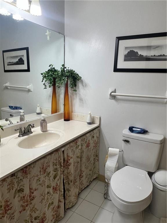 2194 Meadow Dr, Snellville, GA 30078 - half bath with toilet, vanity, and tile patterned flooring