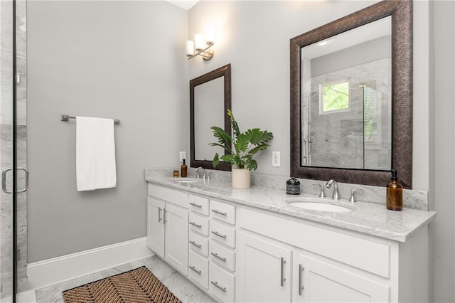 1202 Hardee St NE, Atlanta, GA 30307 - bathroom with double vanity, marble finish flooring, baseboards, and a shower stall