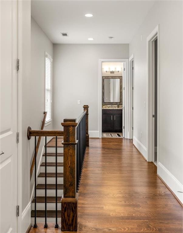 1202 Hardee St NE, Atlanta, GA 30307 - hall with dark wood-style floors, recessed lighting, and baseboards
