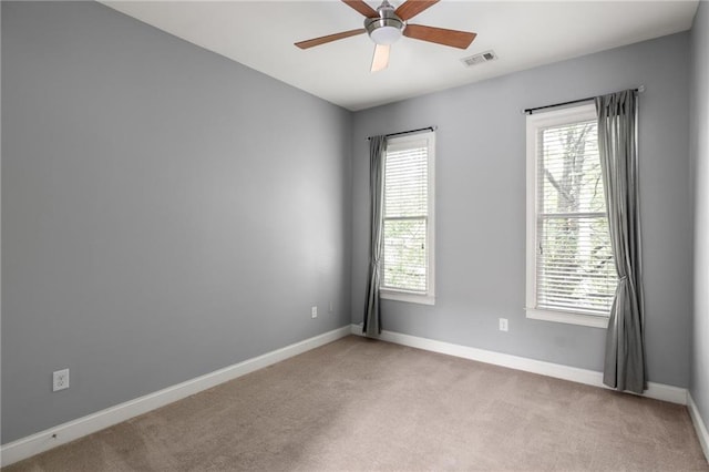 1202 Hardee St NE, Atlanta, GA 30307 - unfurnished room featuring carpet floors, ceiling fan, and baseboards