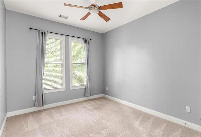 1202 Hardee St NE, Atlanta, GA 30307 - unfurnished room featuring a ceiling fan, baseboards, and carpet