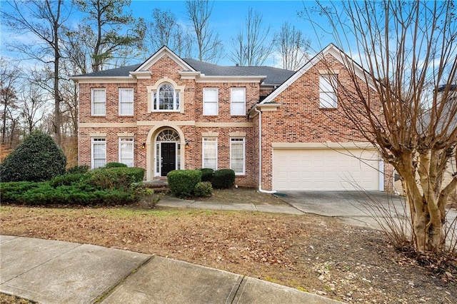 colonial inspired home with a garage