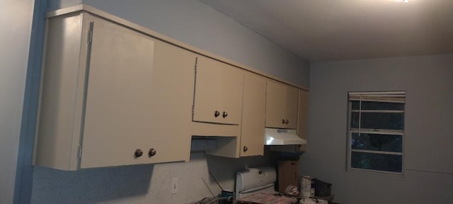 kitchen with white cabinets