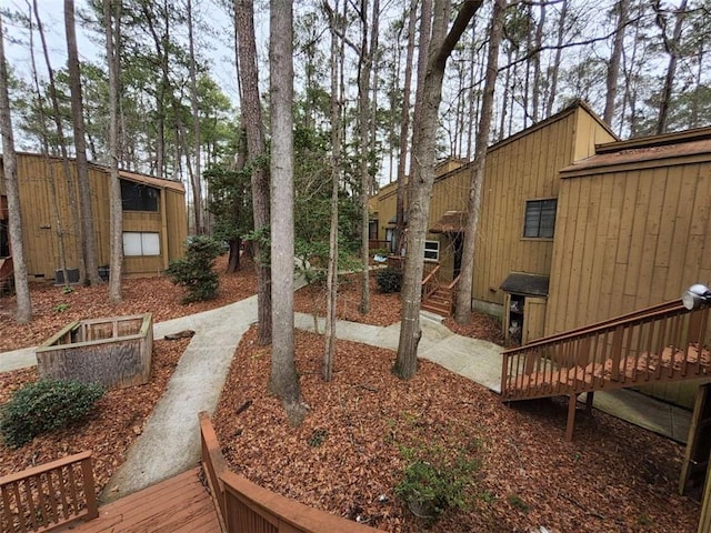 view of yard with a wooden deck