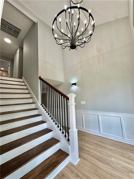 5419 S Lake Dr, Douglasville, GA 30135 - stairway with wood finished floors and baseboards