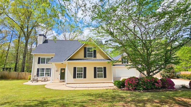 view of front of home with a chimney, a shingled roof, and a garage