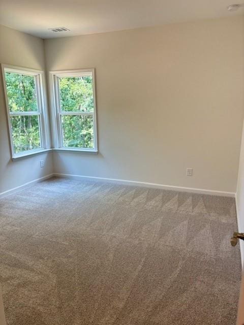 unfurnished room with carpet