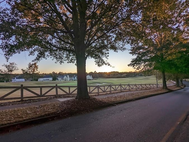 view of gate at dusk