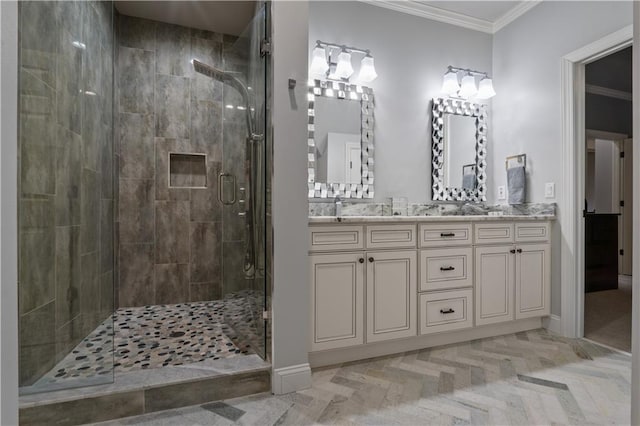 bathroom with crown molding, vanity, and walk in shower