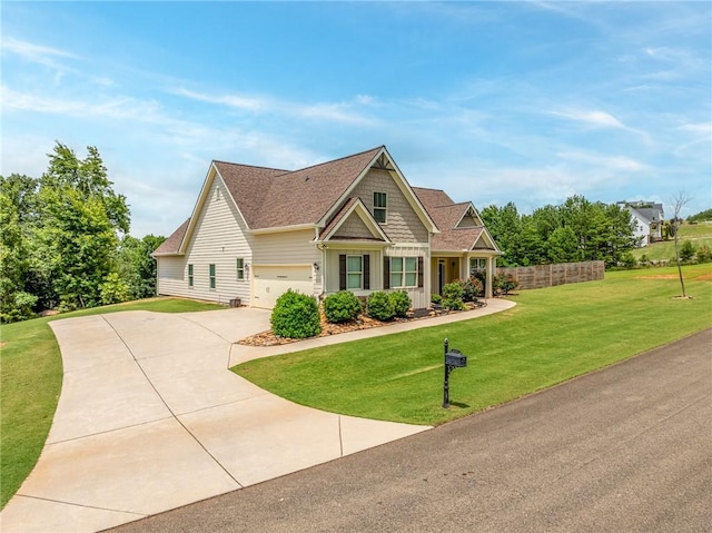 415 Stoneledge Rd, Jasper, GA 30143 - craftsman-style house featuring concrete driveway, a front lawn, a garage, and a shingled roof