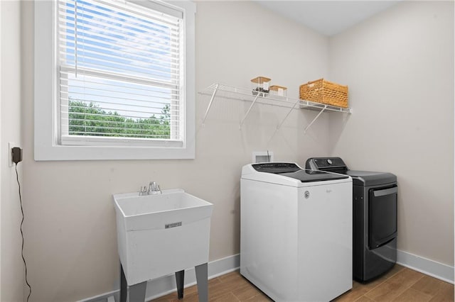 415 Stoneledge Rd, Jasper, GA 30143 - laundry room with washing machine and dryer and light wood-style flooring