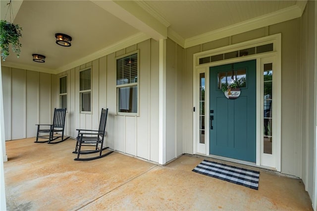 415 Stoneledge Rd, Jasper, GA 30143 - view of exterior entry featuring covered porch and board and batten siding