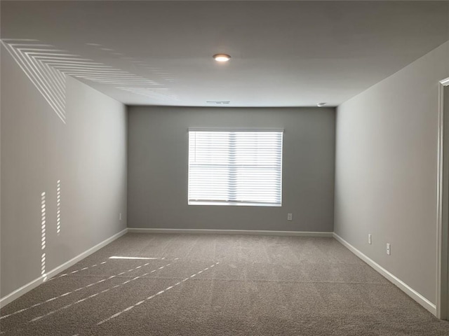 empty room featuring carpet