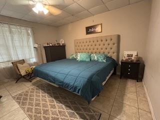 337 Long Shore Way, Newnan, GA 30265 - bedroom with a drop ceiling, tile patterned flooring, and ceiling fan
