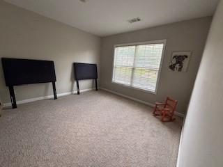 337 Long Shore Way, Newnan, GA 30265 - unfurnished room with baseboards and carpet floors