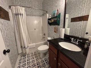 337 Long Shore Way, Newnan, GA 30265 - bathroom featuring wallpapered walls, vanity, and shower / tub combo