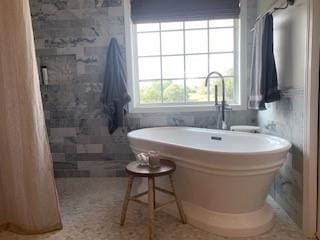 337 Long Shore Way, Newnan, GA 30265 - bathroom with a freestanding tub and tiled shower