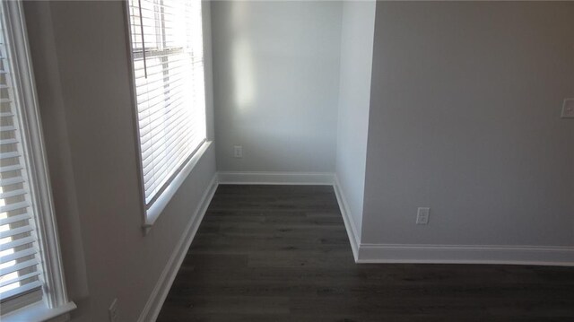 559 Fundao Ln Unit 21, Lawrenceville, GA 30046 - spare room with dark hardwood / wood-style flooring