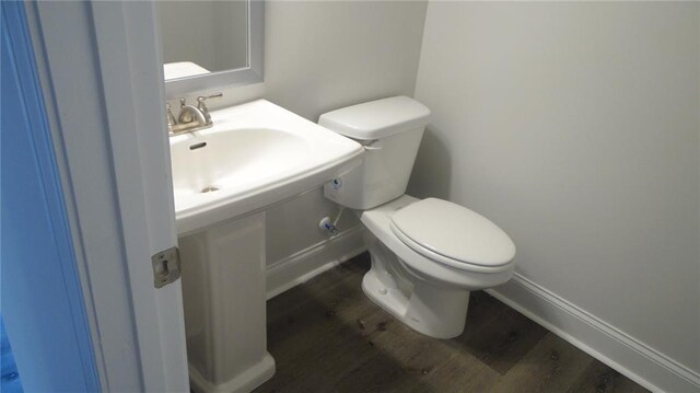 559 Fundao Ln Unit 21, Lawrenceville, GA 30046 - bathroom with sink, hardwood / wood-style floors, and toilet
