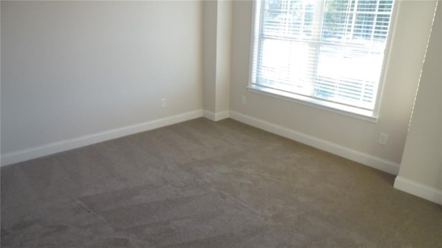 559 Fundao Ln Unit 21, Lawrenceville, GA 30046 - spare room with carpet flooring