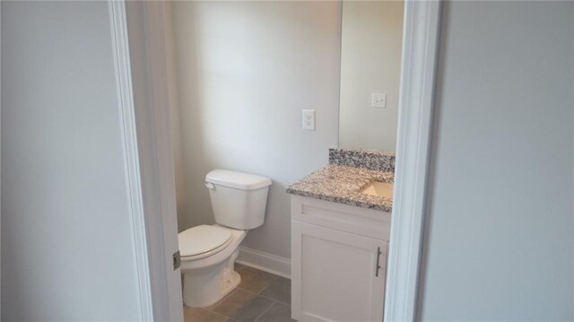 559 Fundao Ln Unit 21, Lawrenceville, GA 30046 - bathroom with tile patterned floors, vanity, and toilet