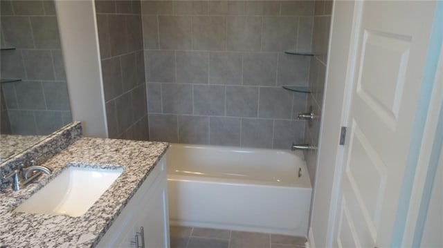 559 Fundao Ln Unit 21, Lawrenceville, GA 30046 - bathroom featuring vanity, tile patterned flooring, and tiled shower / bath combo