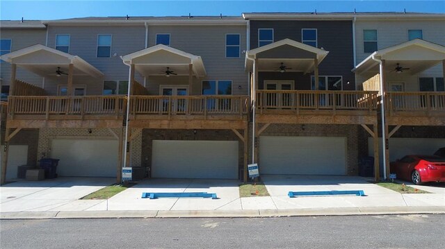 559 Fundao Ln Unit 21, Lawrenceville, GA 30046 - view of front of property featuring ceiling fan and a garage