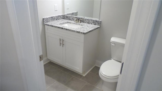 559 Fundao Ln Unit 21, Lawrenceville, GA 30046 - bathroom featuring tile patterned floors, vanity, and toilet