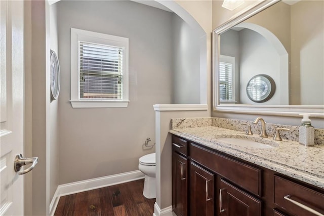 5365 Vendelay Ln, Cumming, GA 30040 - bathroom featuring baseboards, vanity, wood finished floors, and toilet