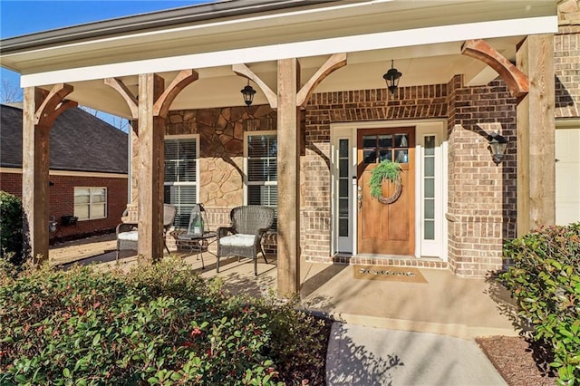 5365 Vendelay Ln, Cumming, GA 30040 - view of exterior entry featuring brick siding and a porch