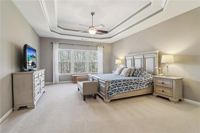 5365 Vendelay Ln, Cumming, GA 30040 - bedroom featuring a raised ceiling, light colored carpet, baseboards, ceiling fan, and crown molding