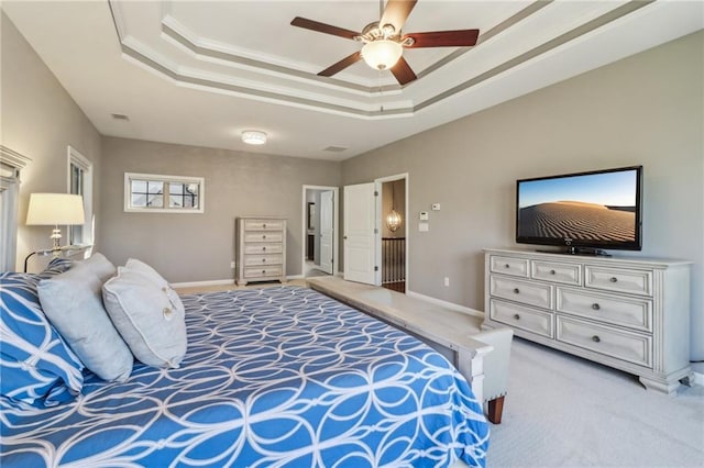 5365 Vendelay Ln, Cumming, GA 30040 - bedroom with light colored carpet, a tray ceiling, baseboards, and ceiling fan