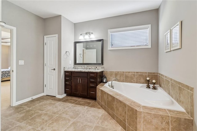 5365 Vendelay Ln, Cumming, GA 30040 - full bathroom featuring vanity, a garden tub, and tile patterned floors
