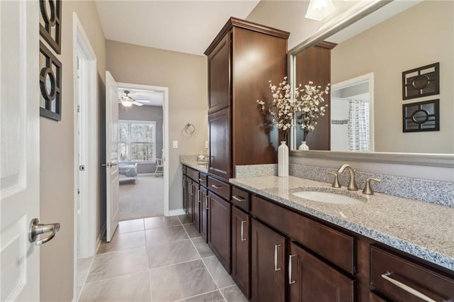 5365 Vendelay Ln, Cumming, GA 30040 - full bathroom with vanity, a ceiling fan, tile patterned floors, and baseboards
