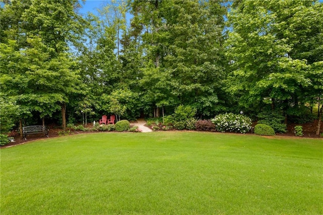 5365 Vendelay Ln, Cumming, GA 30040 - view of grassy yard with view of wooded area
