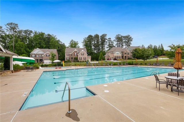 5365 Vendelay Ln, Cumming, GA 30040 - community pool with a patio area