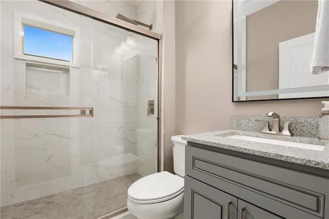 5365 Vendelay Ln, Cumming, GA 30040 - full bathroom with toilet, vanity, and a marble finish shower