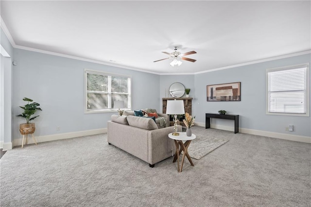 living room featuring carpet floors, baseboards, and crown molding