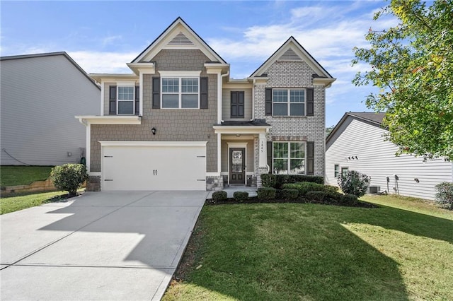 craftsman inspired home featuring an attached garage, concrete driveway, central AC, and a front yard